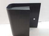 a black trash can and a black trash can on a white surface