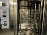 an image of a stainless steel oven with the door open