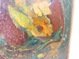 une photo d'un tableau représentant une fleur accroché au mur
