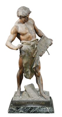 an image of a statue of a man holding a newspaper