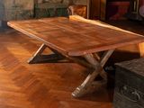 a wooden table that is sitting on a hard wood floor