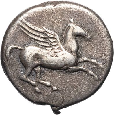 an ancient silver coin with a winged horse on it ' s back