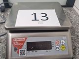 an image of a digital scale on a counter top
