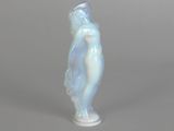 an image of a glass sculpture of a woman