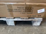 a cardboard box sitting on a pallet in a warehouse