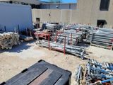 a lot of pipes and pipes in a yard
