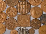 a lot of coins that are laying on a table