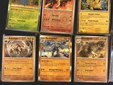 many different types of pokemon cards on the table