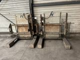 two pallets that are sitting next to each other in a warehouse