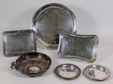 a lot of silver items that are on the table