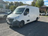 a white van parked in a parking lot