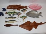 many different types of fishing items on the table