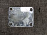 an image of a metal plate on a piece of cloth