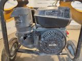 an image of a small engine on a cart