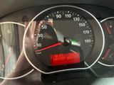 a close up of a car dashboard with a speedometer