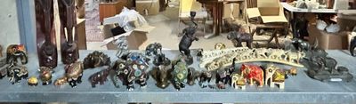 a lot of figurines on a shelf in a store