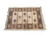 a close up of a rug on a white surface with a white background
