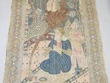an oriental rug with a woman holding a fan on it