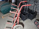 a small hand truck that is sitting in a garage