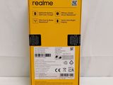 the back of a yellow box with a black label on it