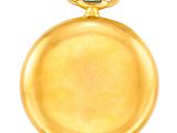 gold pocket watch on a white background with a white background