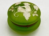 a green box with a picture of a woman on it