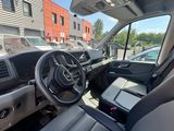 a view of the inside of a truck from the driver ' s seat