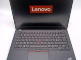 a close up of a laptop with a lenovo logo on the screen