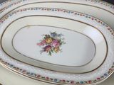 a lot of plates that are sitting on a table