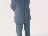 a figurine of a man in a blue suit and tie