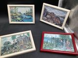 three framed pictures of a train, a cabin, and a river