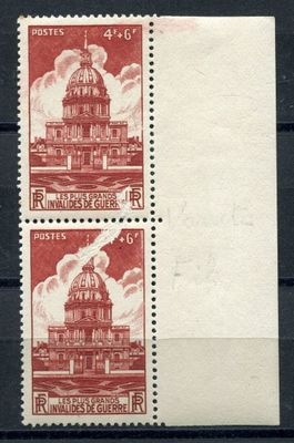 two stamps with a picture of a building on them