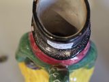 a small vase that is sitting on top of a table