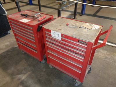 two red tool boxes sitting on top of each other