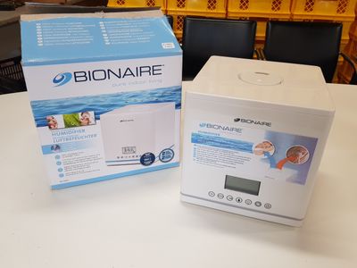 a box of bioaire on a table next to a box of water