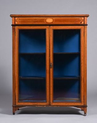 a wooden cabinet with blue glass doors and two shelves