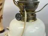 a white lamp that is sitting on a table