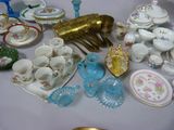 a table with a lot of different types of dishes and cups