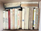 a box full of books that are sitting on a table