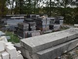 a pile of concrete blocks sitting in the middle of a field