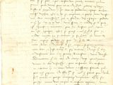 lettre manuscrite écrite à l'encre noire sur une feuille de papier