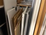 a lot of different types of doors and windows in this room