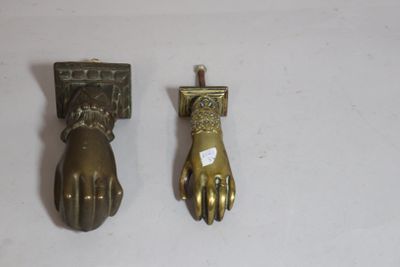 pair of antique brass hand door knockets