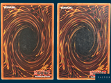 two cards that have a picture of a spiral design on them