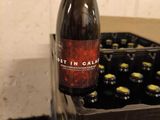a bottle of beer that is sitting in a box