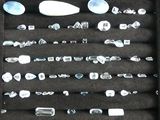 a display case with a lot of glass items in it