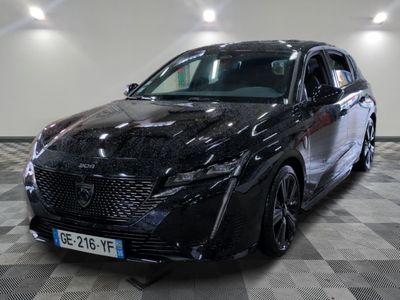 a picture of a black car parked in a garage
