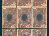 nine squares of different colors with a black hole in the middle