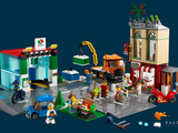 a lego city with a lot of people on the street