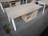 several desks that are sitting in a room